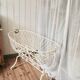 Antique wrought iron rocking chair