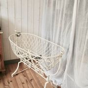 Antique wrought iron rocking chair