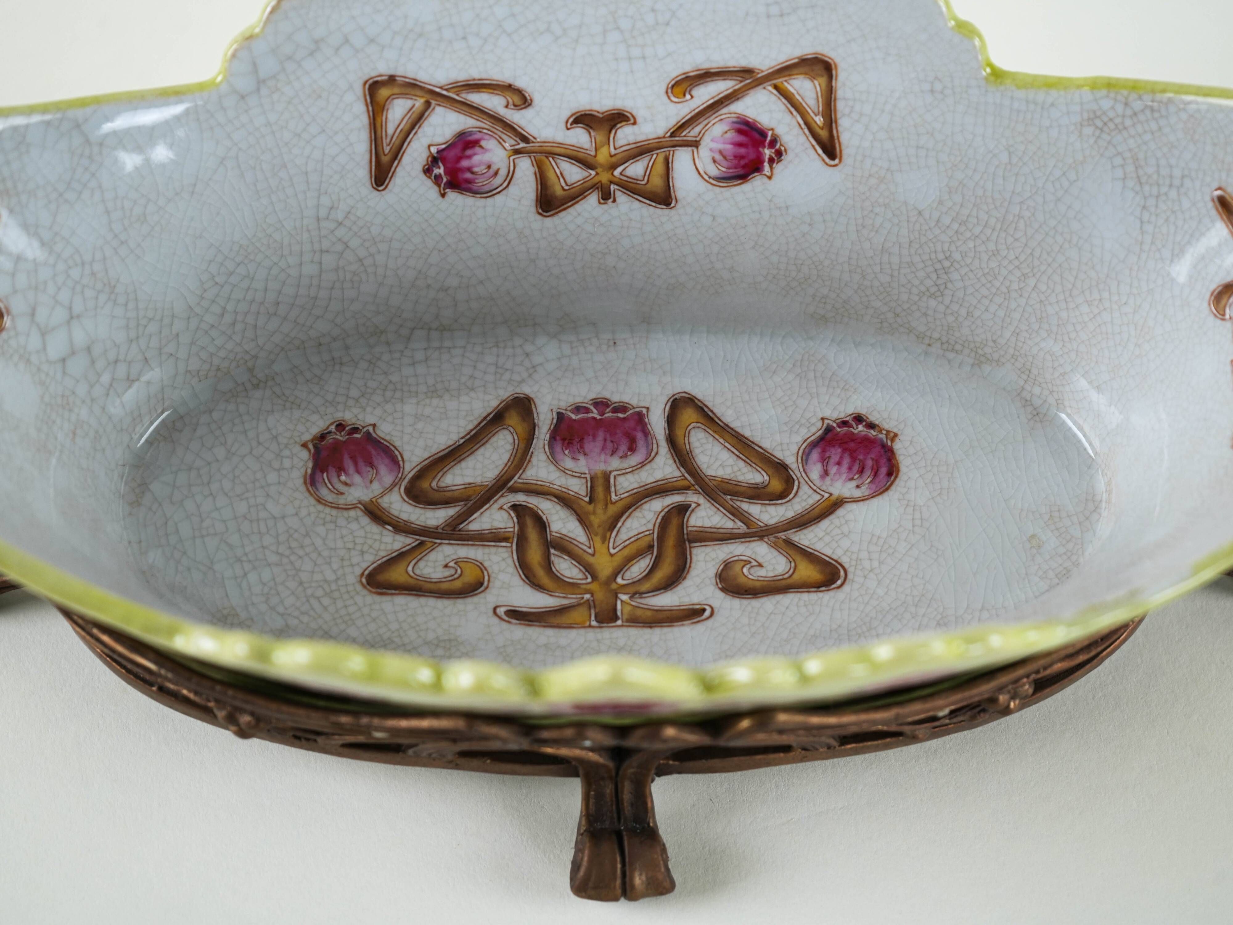 Art Nouveau ceramic platter with glazed golden finish in decorative metal frame, European