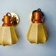 Pair of articulated "Cocoon" wall lights, resin and pine, Italy, 1970