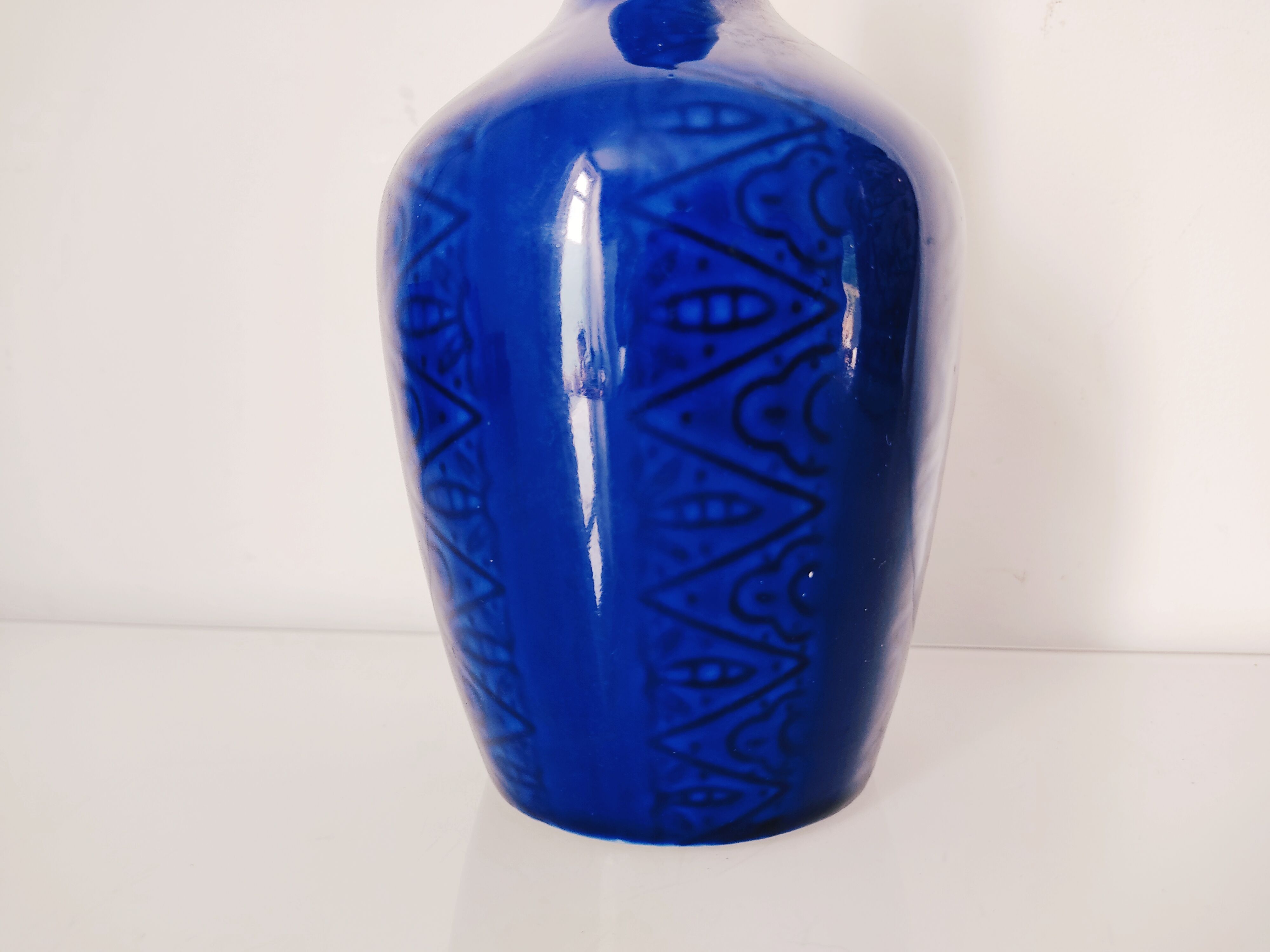 Blue vase geometric incised decoration