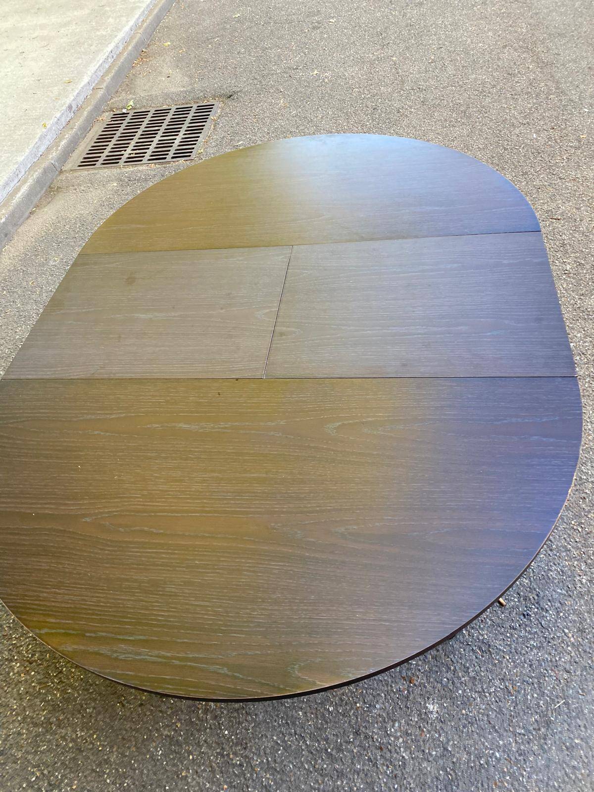 Contemporary round extendable Scandinavian dining table in wenge 1990