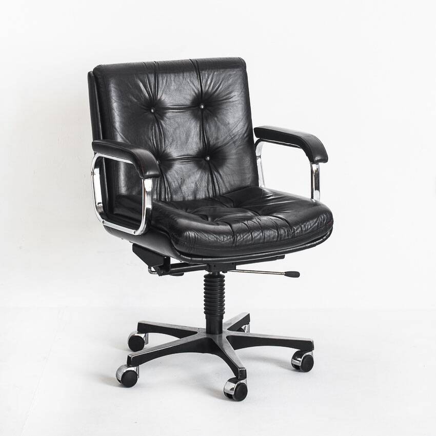 Vintage leather armchair. Swivel, on casters, multi-position. Norway, 1970s.