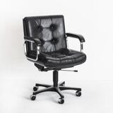 Vintage leather armchair. Swivel, on casters, multi-position. Norway, 1970s.