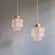 Pair of Art Deco Skyscraper satin glass pendant lights, 1930s