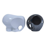 Two iridescent black and white ceramic elephants design