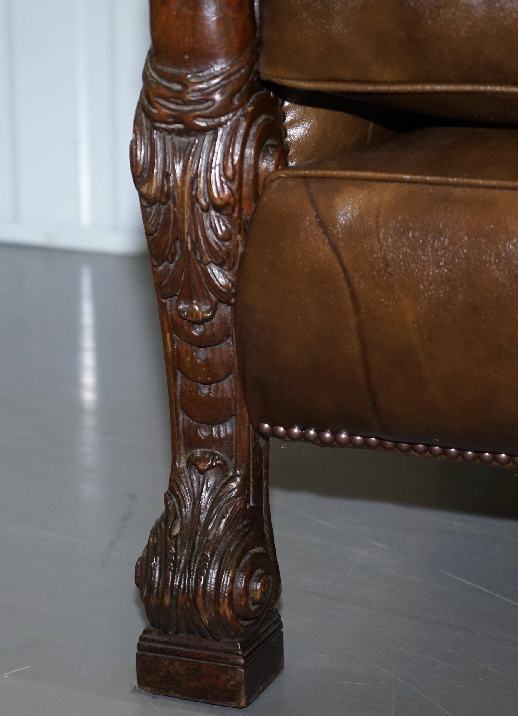 Restored Regency canapé in leather with sculpted Hermès frame.