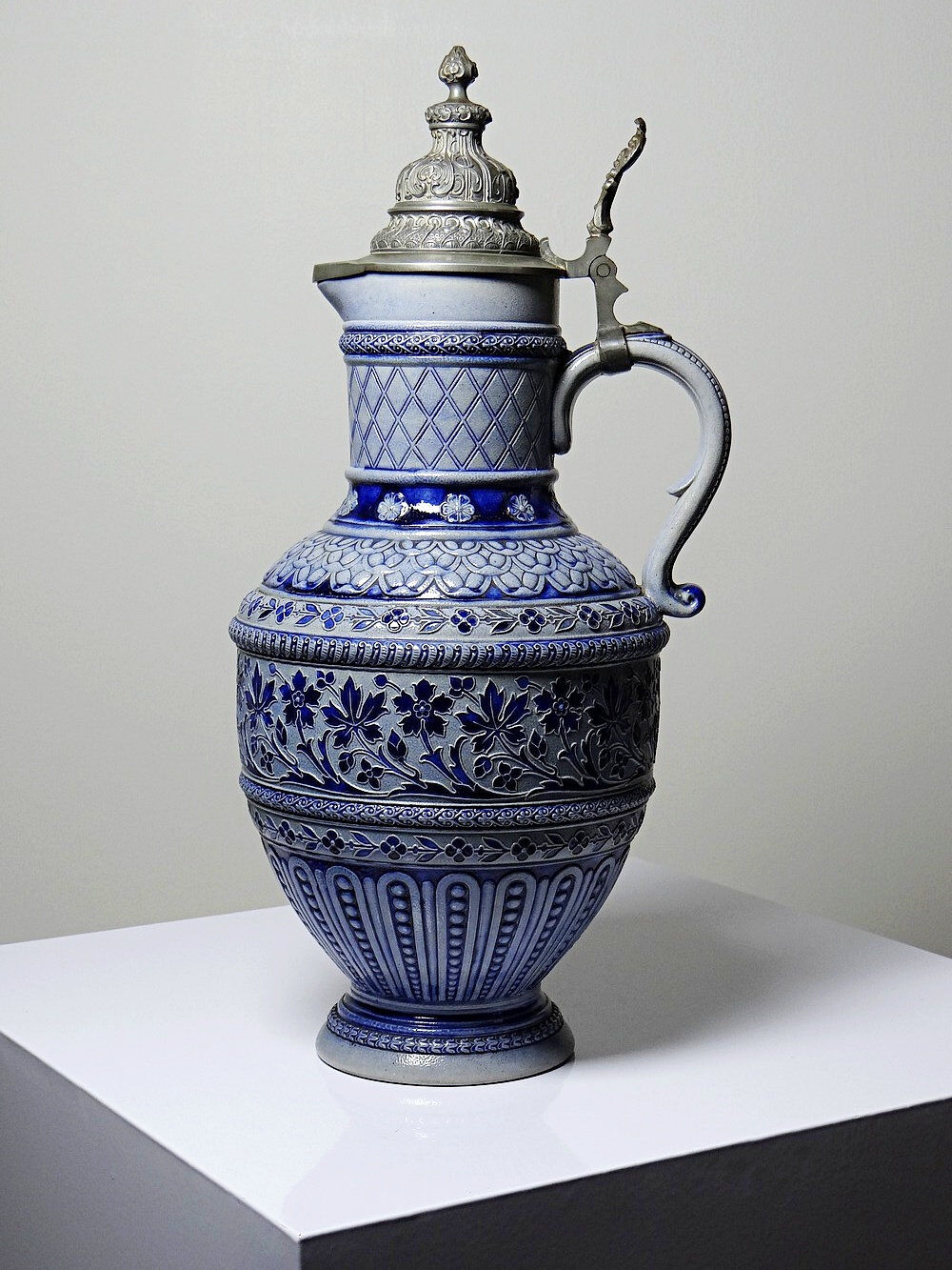 Large salt-glazed stoneware beer jug with tin, Germany, Westerwald type.