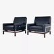 Pair of 50s-60s armchairs in imitation leather, wood and chrome