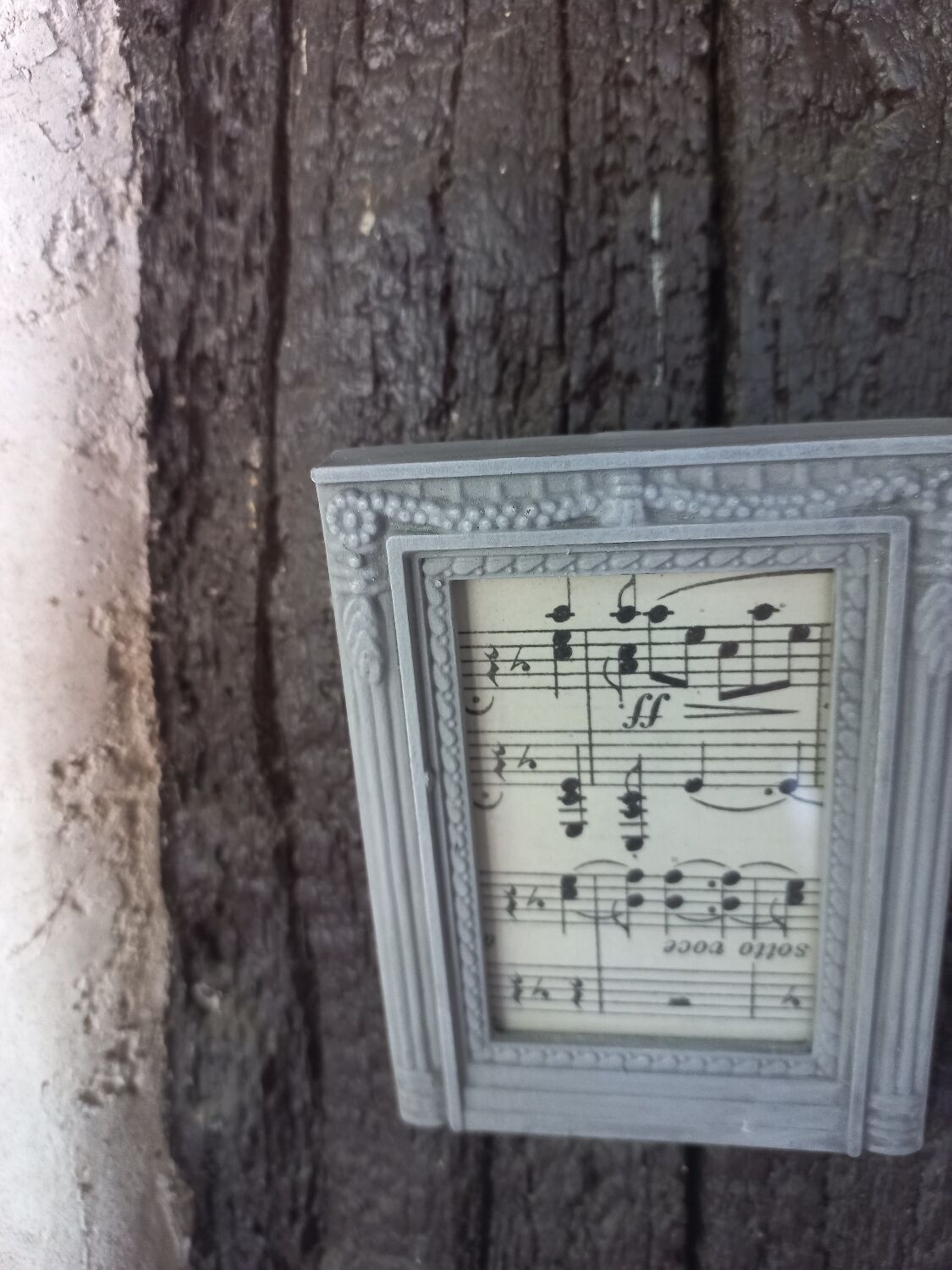 Small patinated photo frame