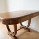Vintage 1960s wooden dining table with extensions.