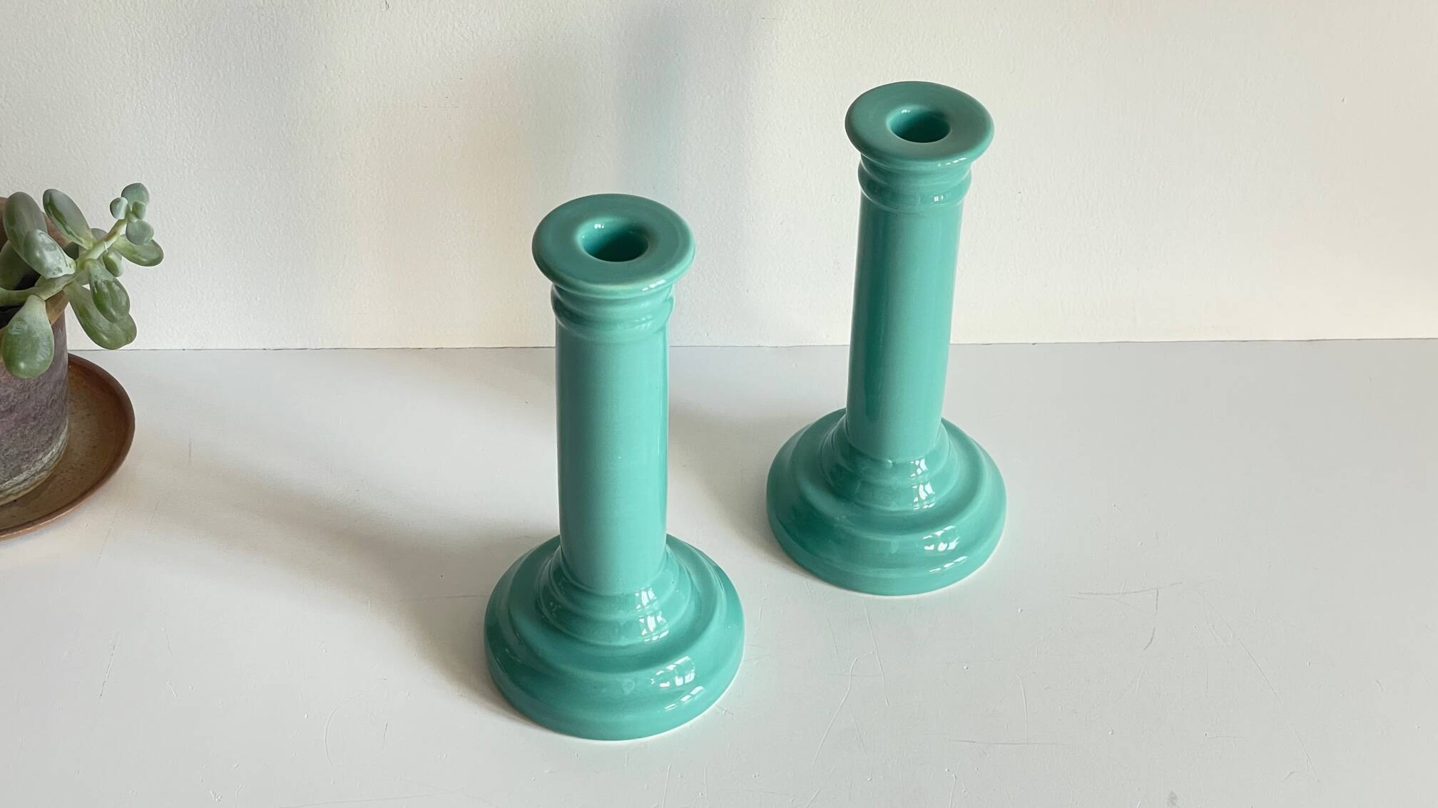 Pair of vintage ocean blue ceramic candlesticks