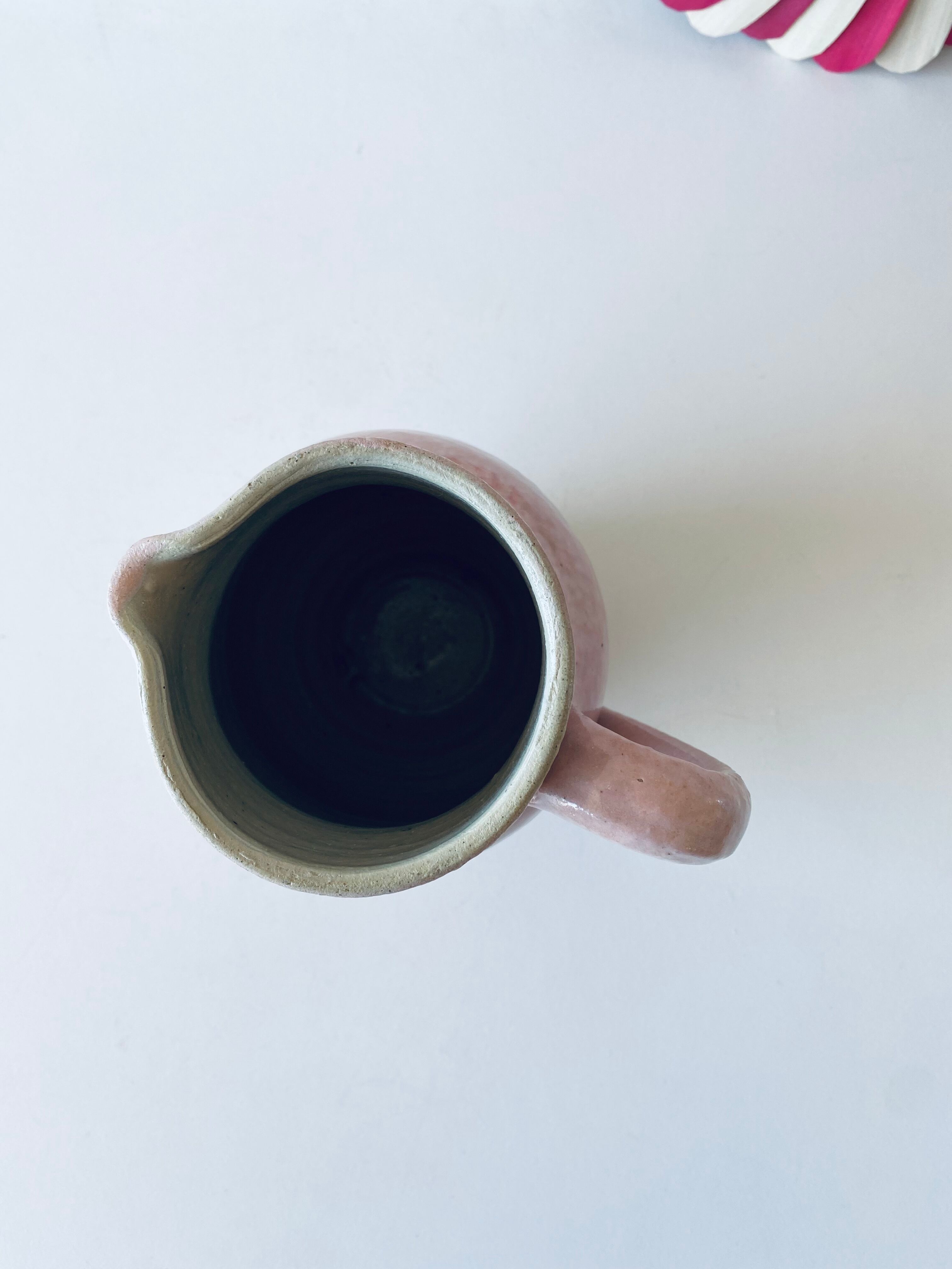 Pitcher in pink glazed ceramic