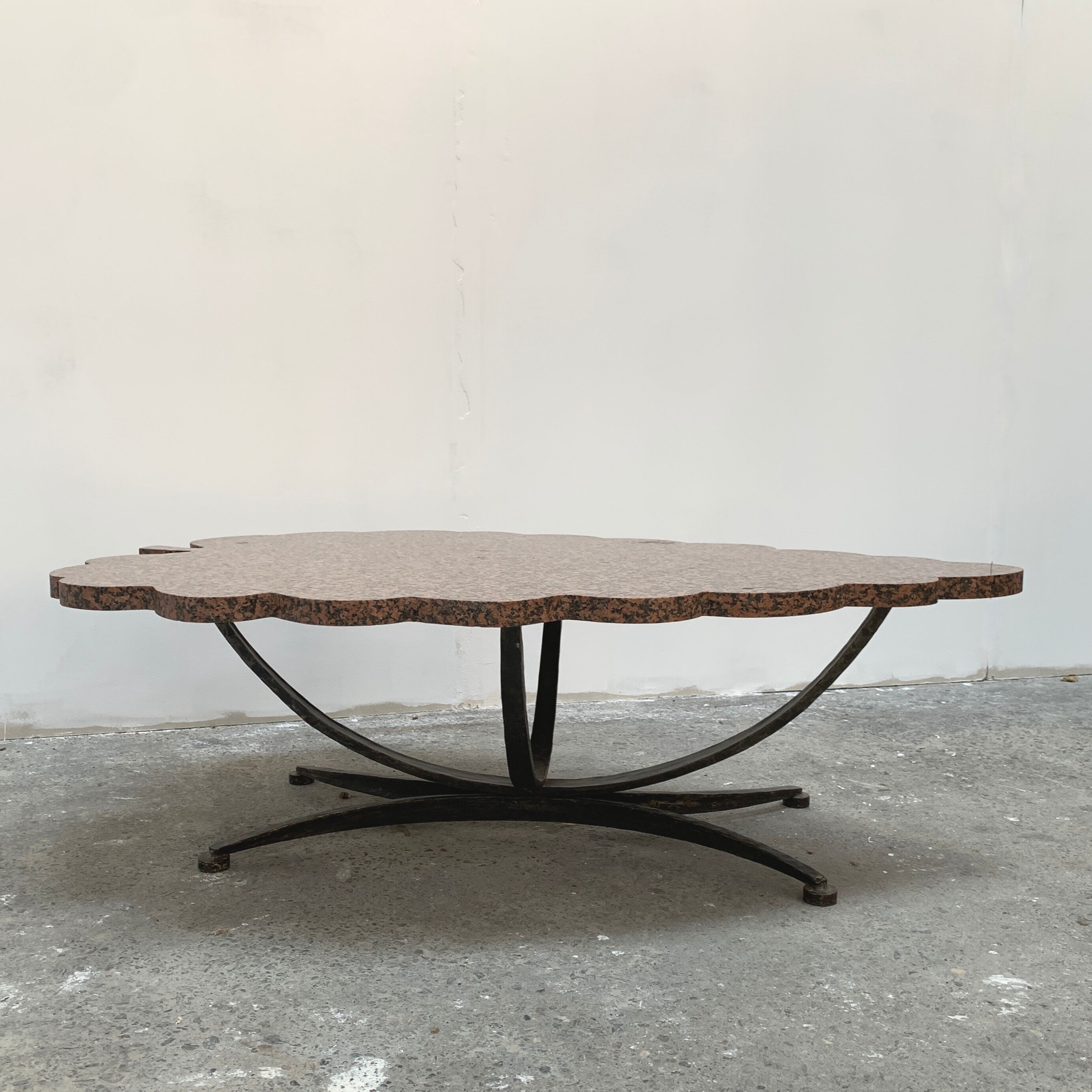 Granite and hammered wrought iron coffee table