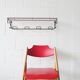 Minimalist wall coat rack in string design in black and red