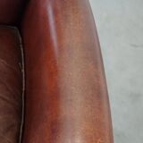 Sheep leather armchair correctly finished with decorative nails