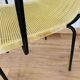 4 yellow outdoor armchairs