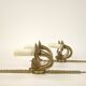 Pair of two-armed Empire wall sconces in gilded bronze