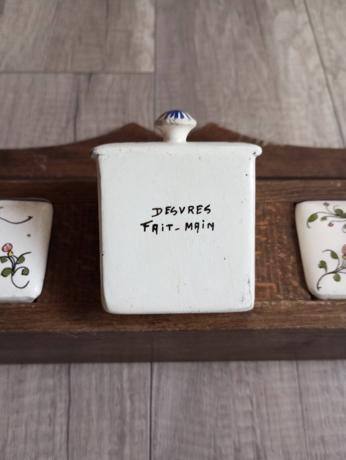 wooden shelf and desvres earthenware drawers