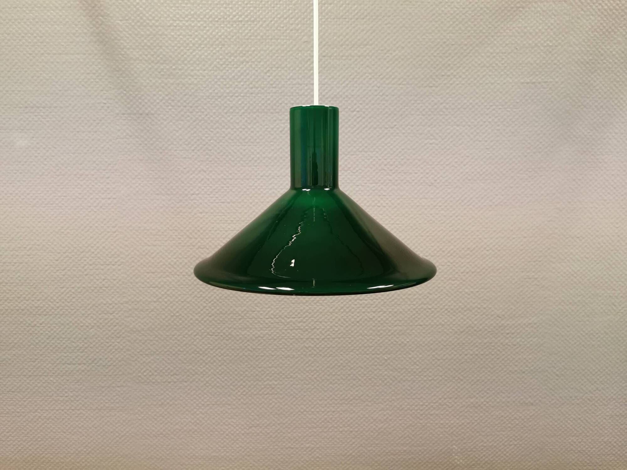 Green glass hanging lamp in double layer glass. Designed by Michael Bang for Holmegaard Denmark 1972