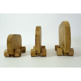Ensemble de trois éléphants en bois à roulette