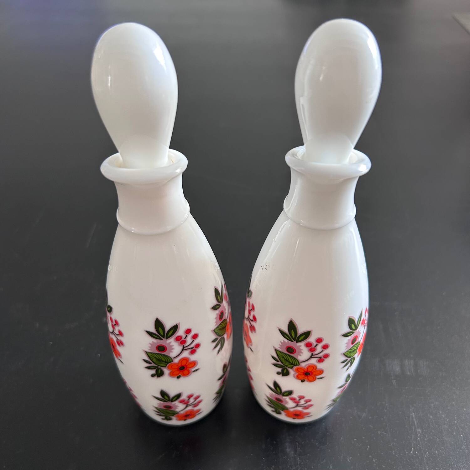 Pair of floral-decorated bottles