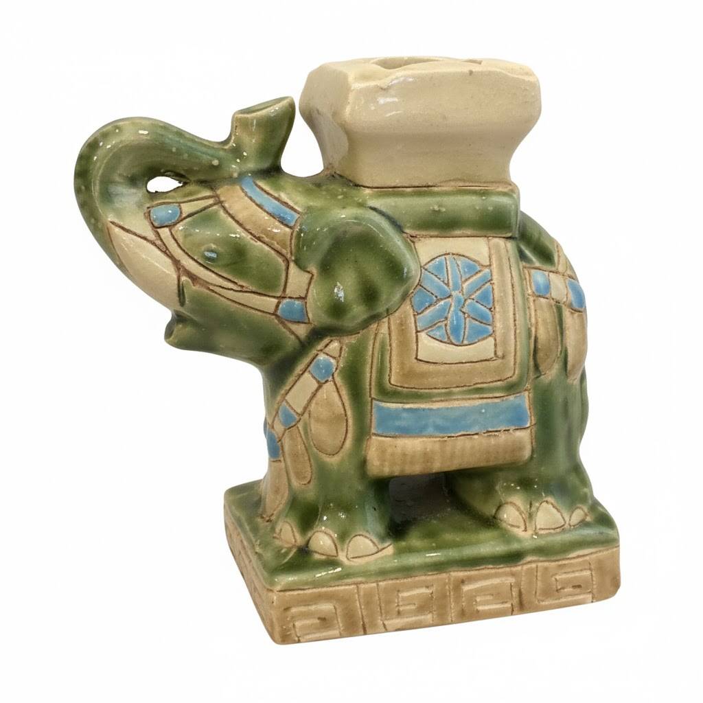 Small green ceramic elephant vase