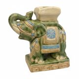 Small green ceramic elephant vase