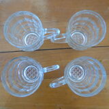 4 transparent glass mugs