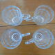 4 mugs en verre transparent