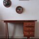 vintage desk with wooden storage drawers