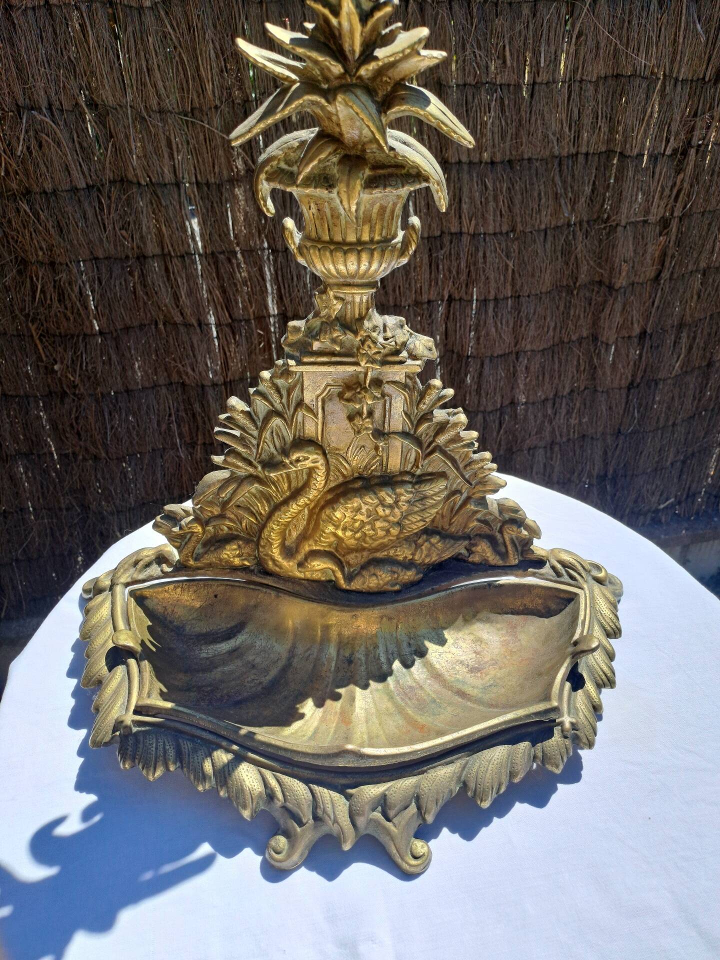 Bronze and brass umbrella stand decorated with a swan.
