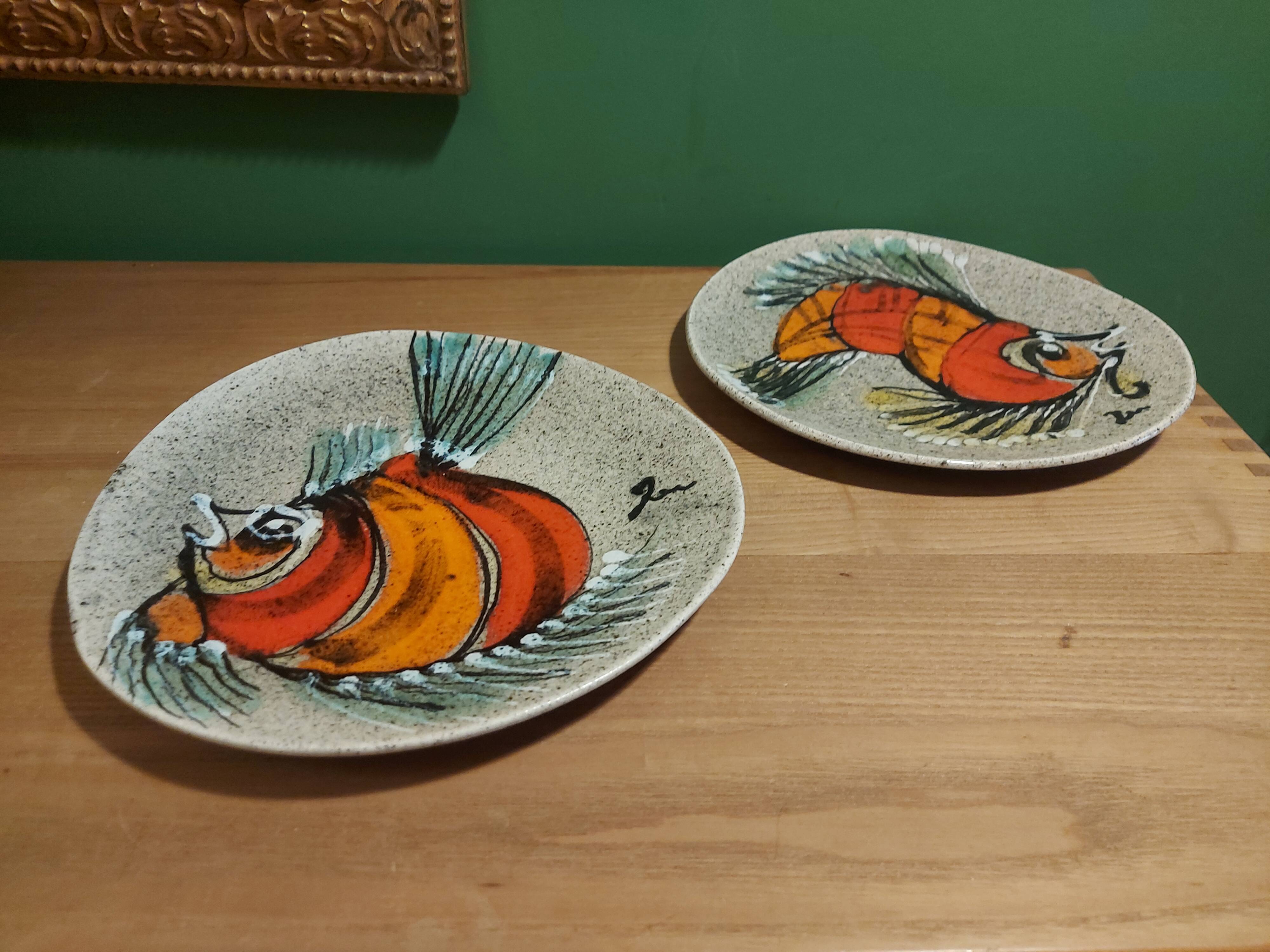2 vintage ceramic plates with fish decoration