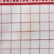White and red embroidered tablecloth and eight matching napkins, 200x150cm