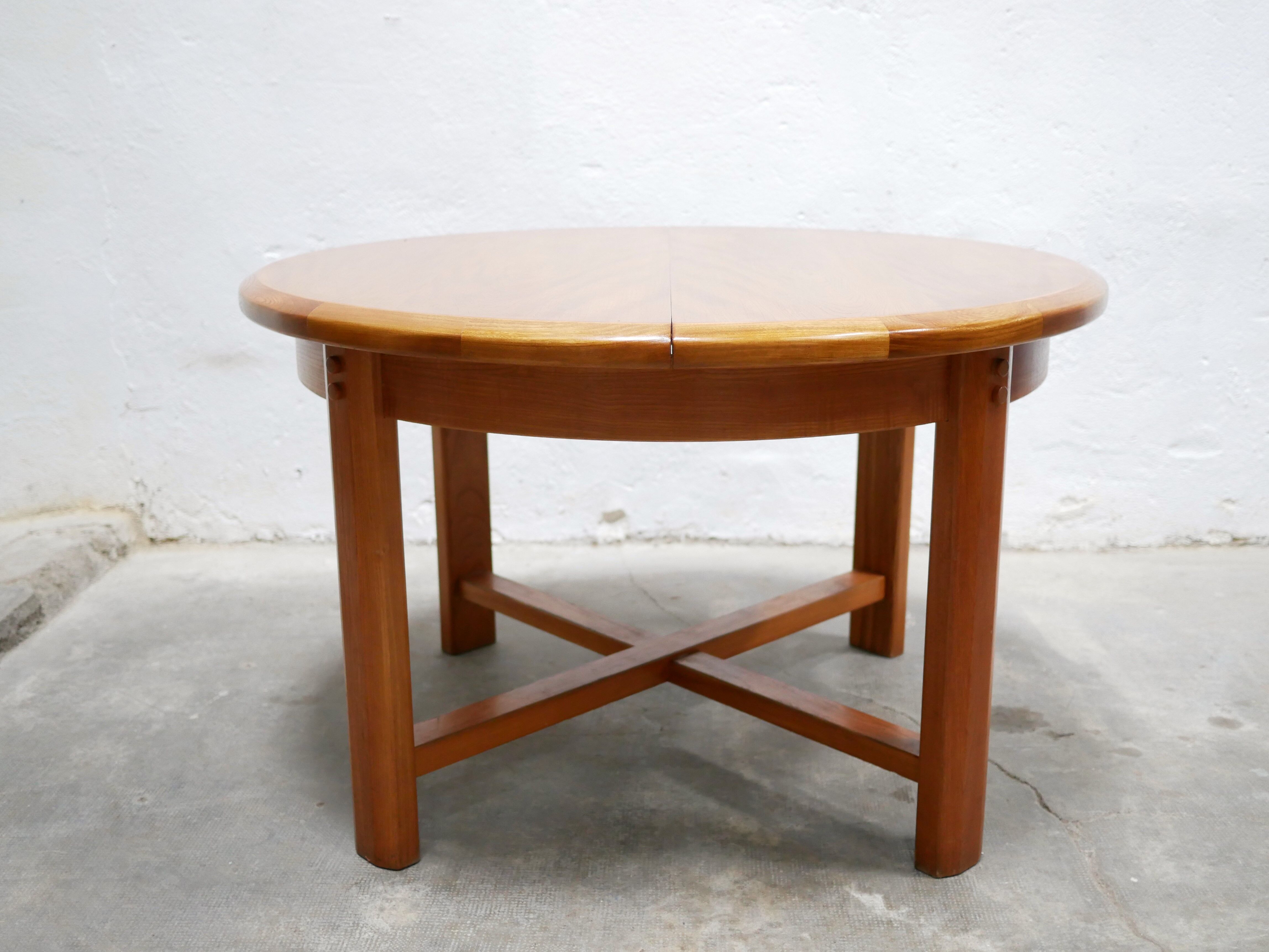 Vintage extendable round wooden dining table
