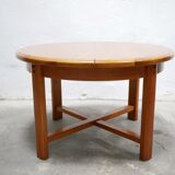 Vintage extendable round wooden dining table