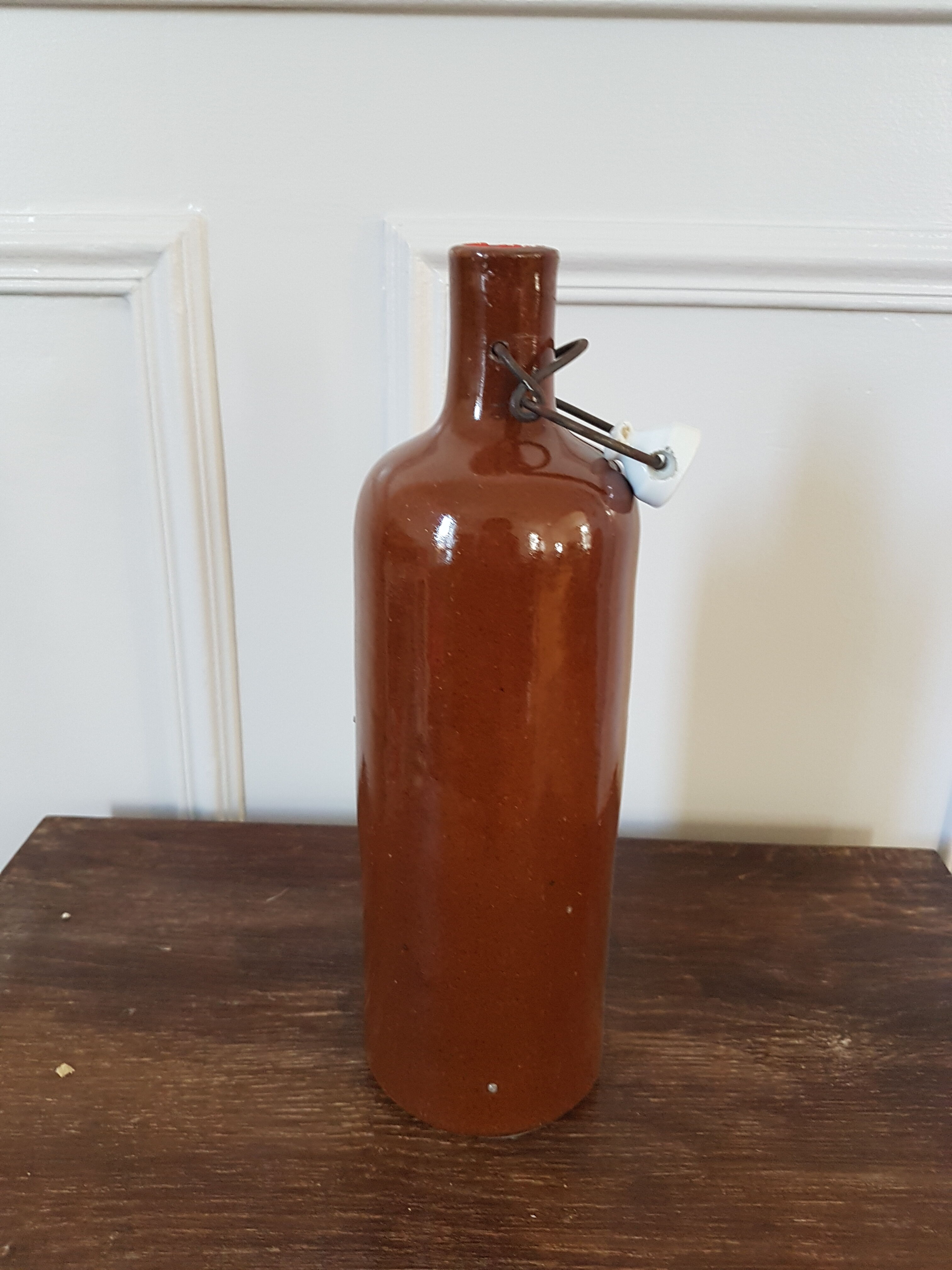 Enamelled stoneware bottle