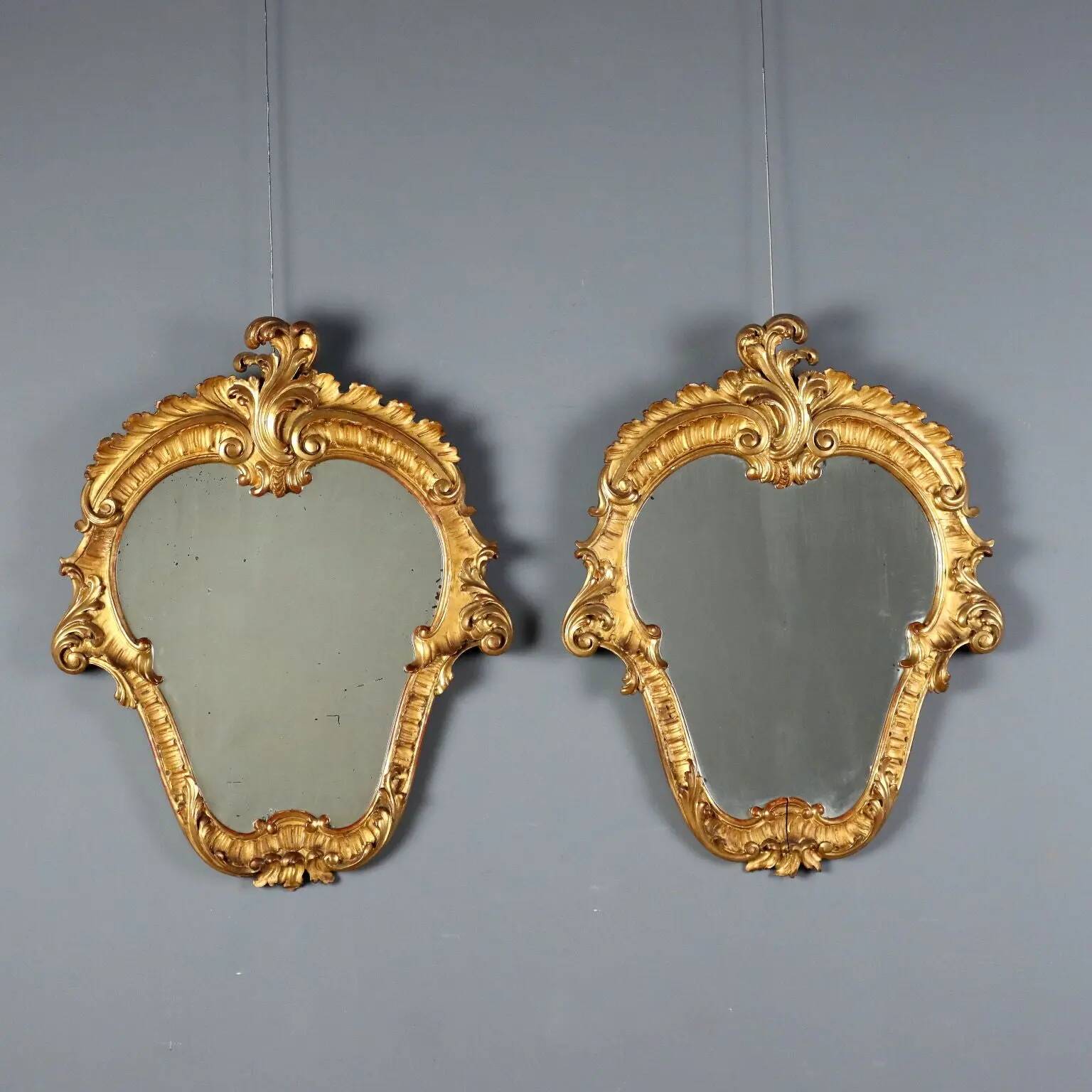 Antique baroque mirrors in carved wood, Italy, 19th century.