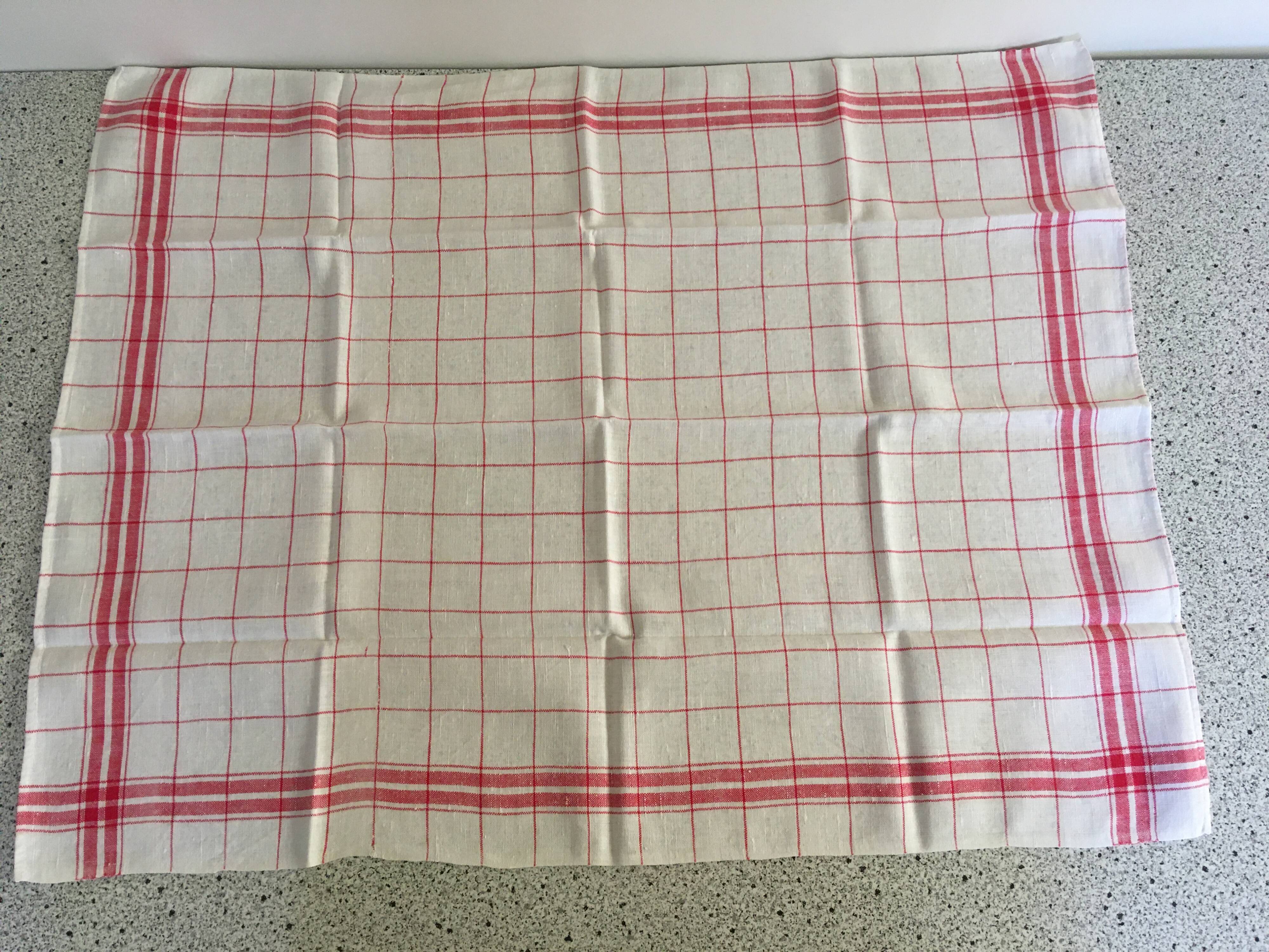 4 red mixed-race tea towels