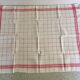 4 red mixed-race tea towels