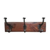 Metal patère on wood