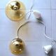 Set of 2 bubbled amber glass globe pendants
