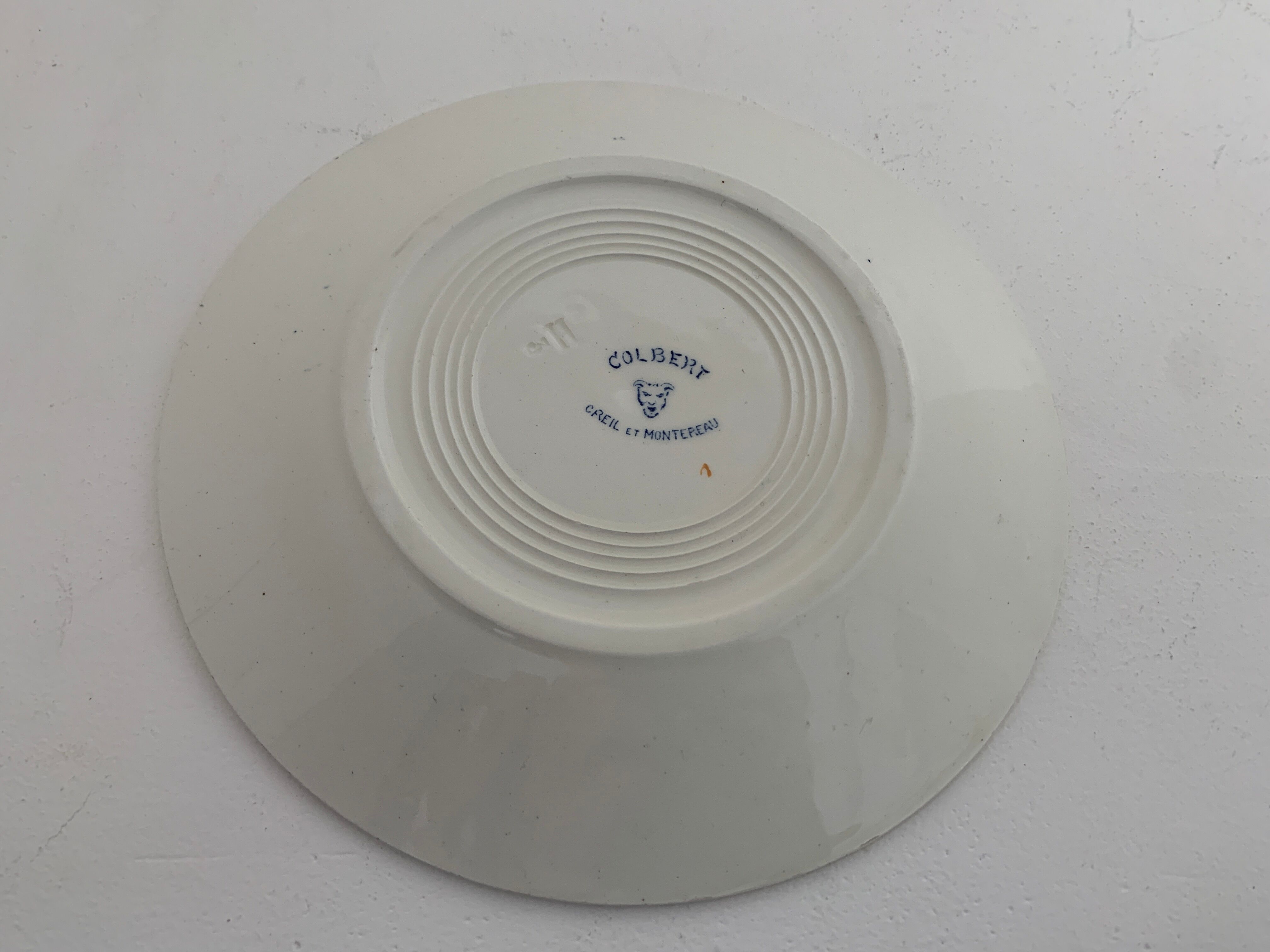 11 old Creil and Montereau dessert plates, Colbert service