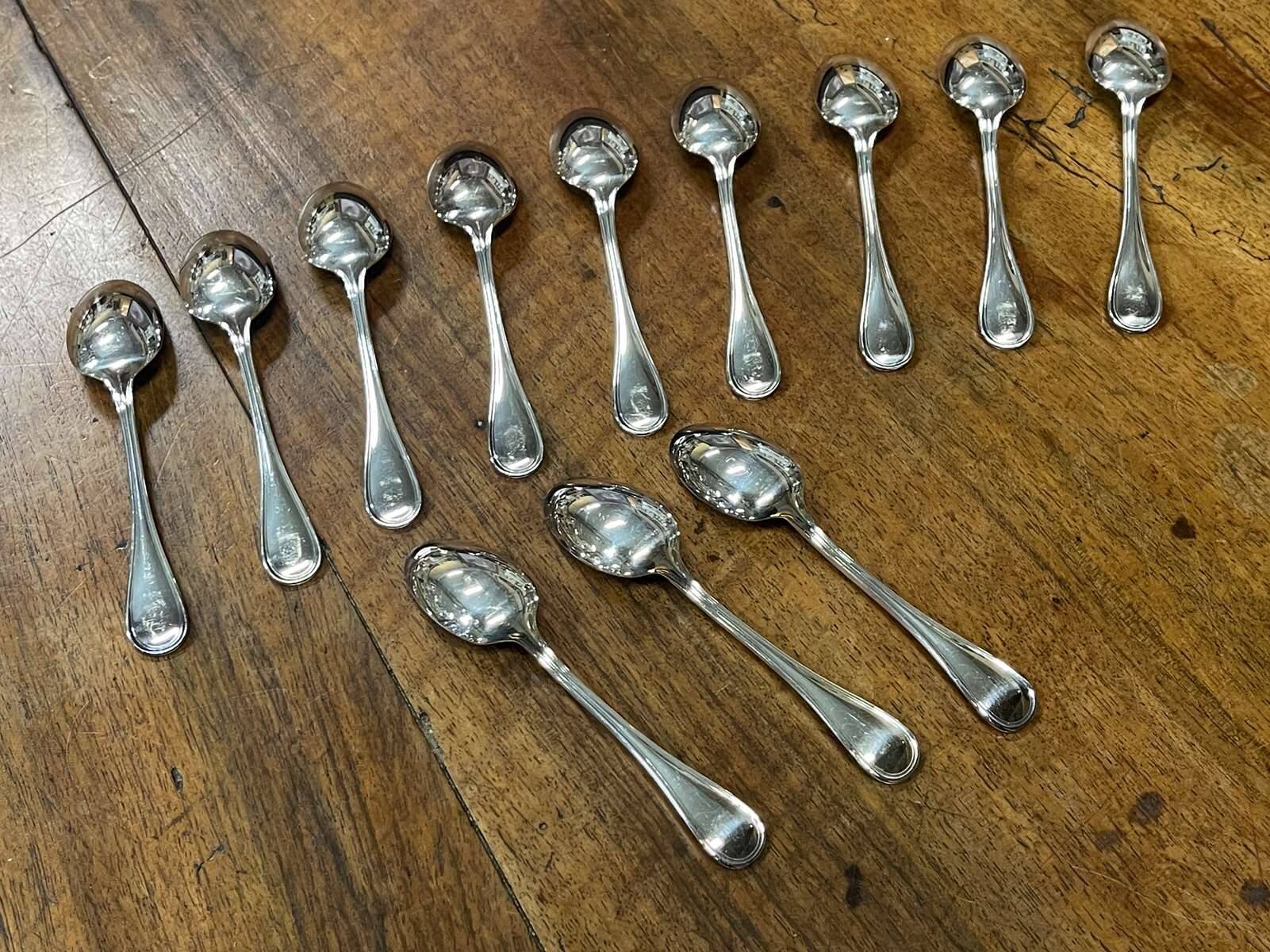 Series of 12 teaspoons in silver metal with their box