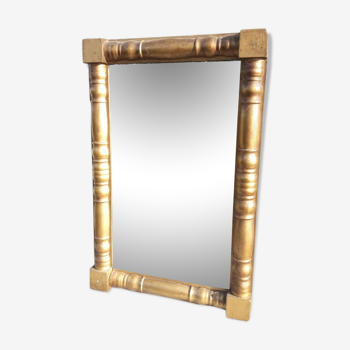 Mirror gilded frame decorated with balusters