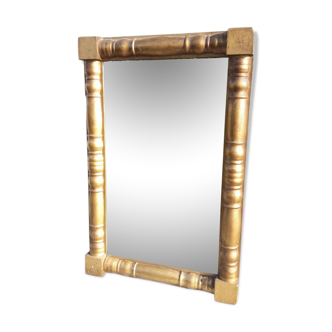 Mirror gilded frame decorated with balusters