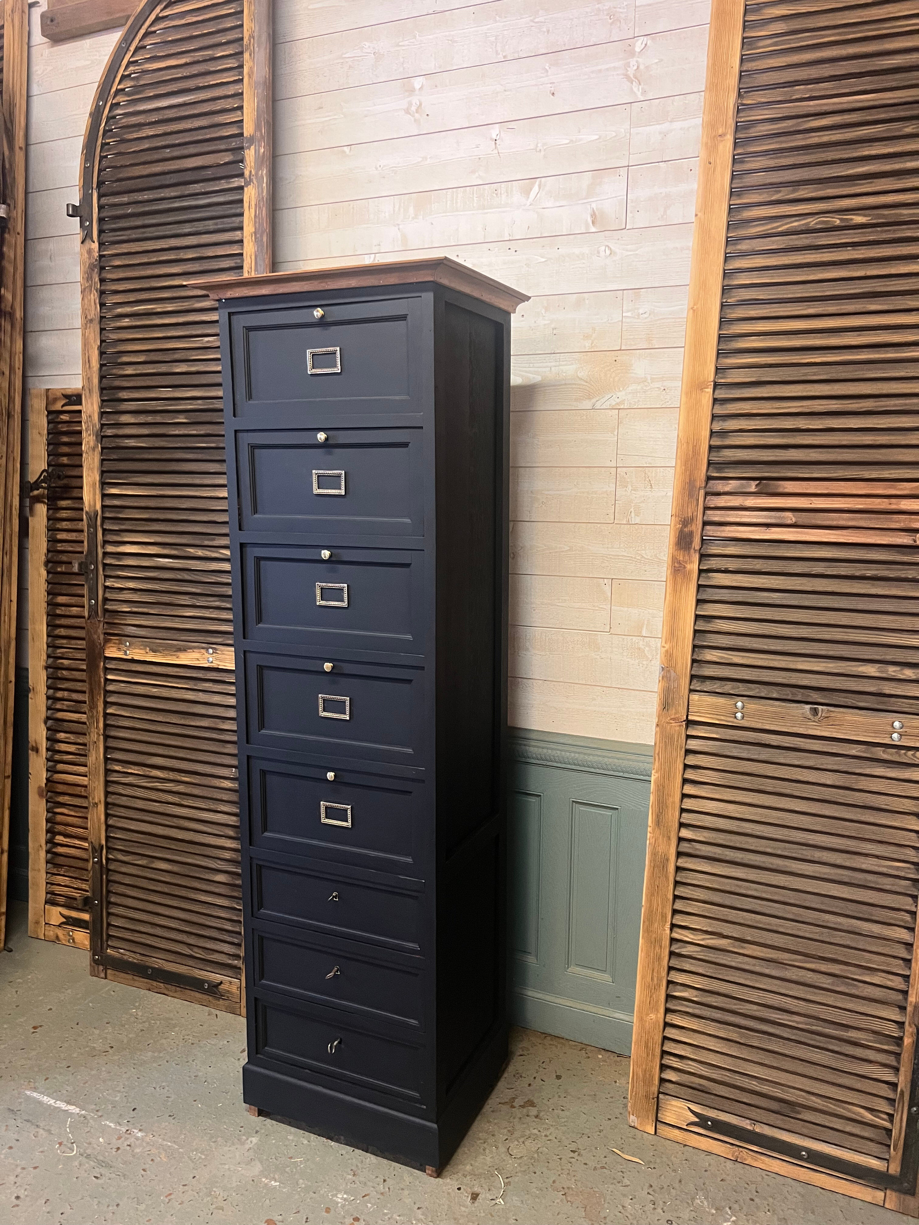 Cabinet with flaps and drawers