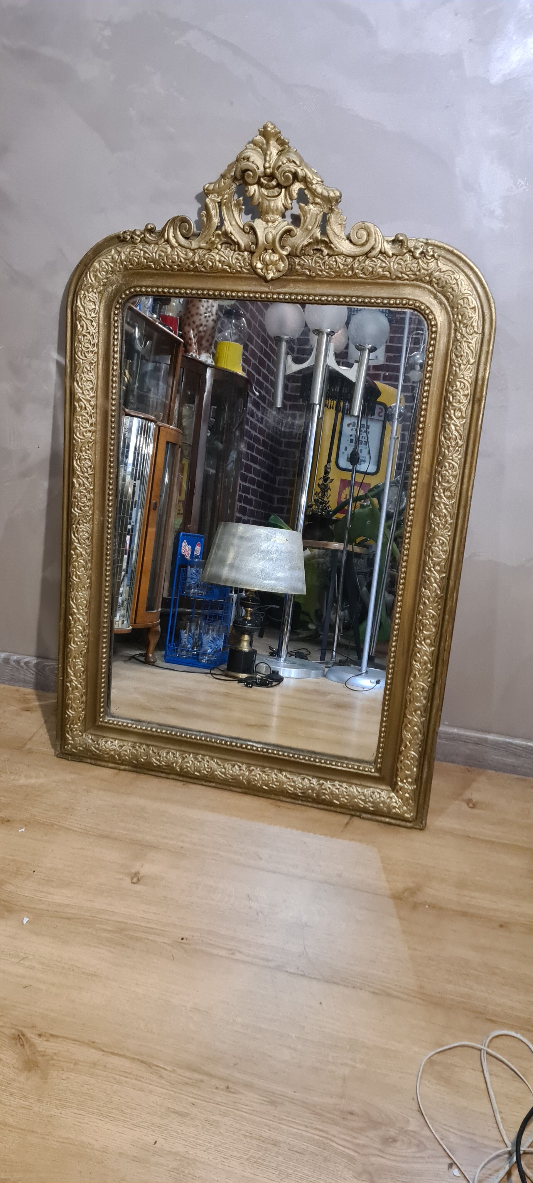 Old Louis Philippe style mirror in gilded wood with pediment
