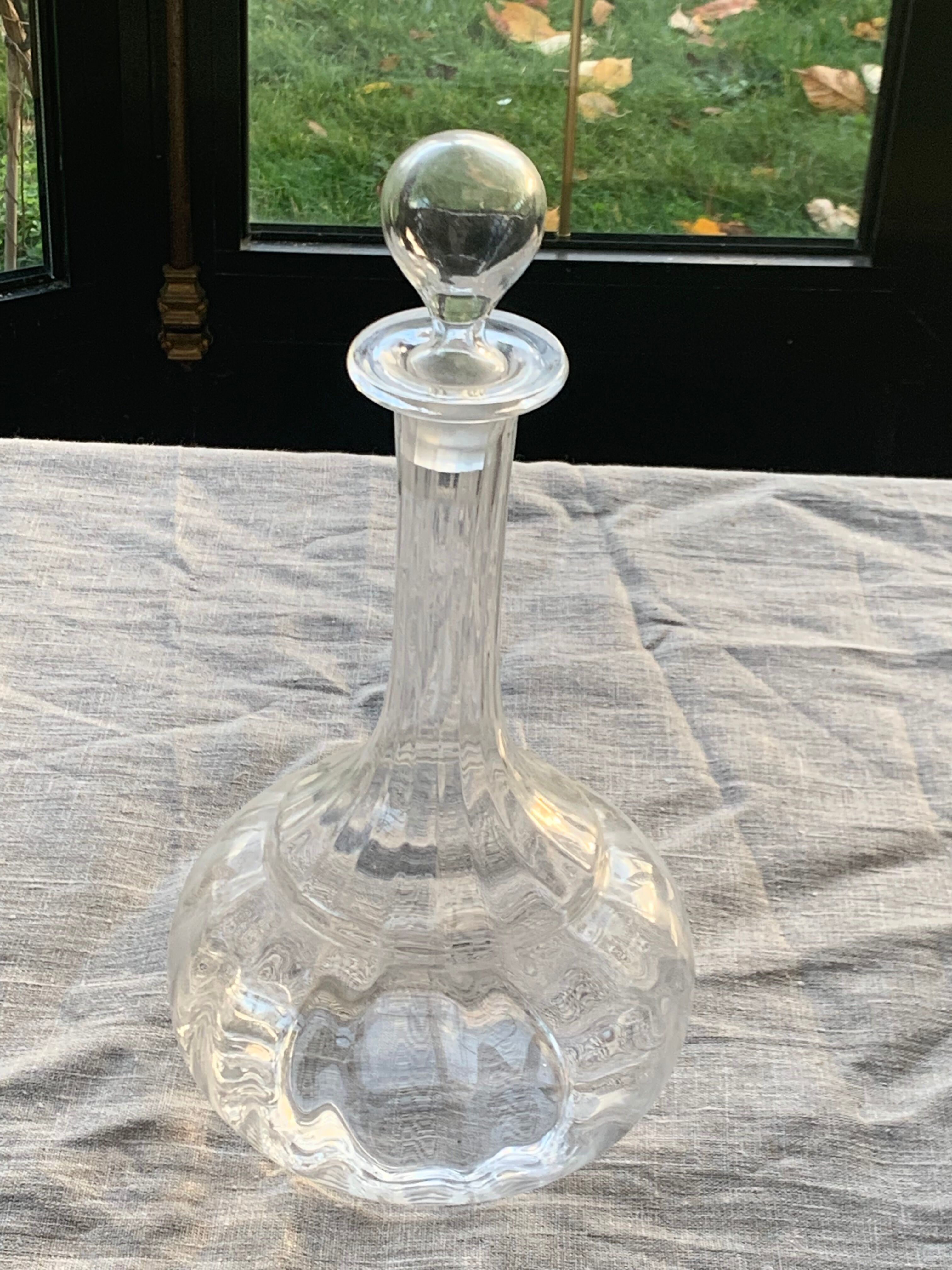 Elegant and vintage transparent glass wine decanter