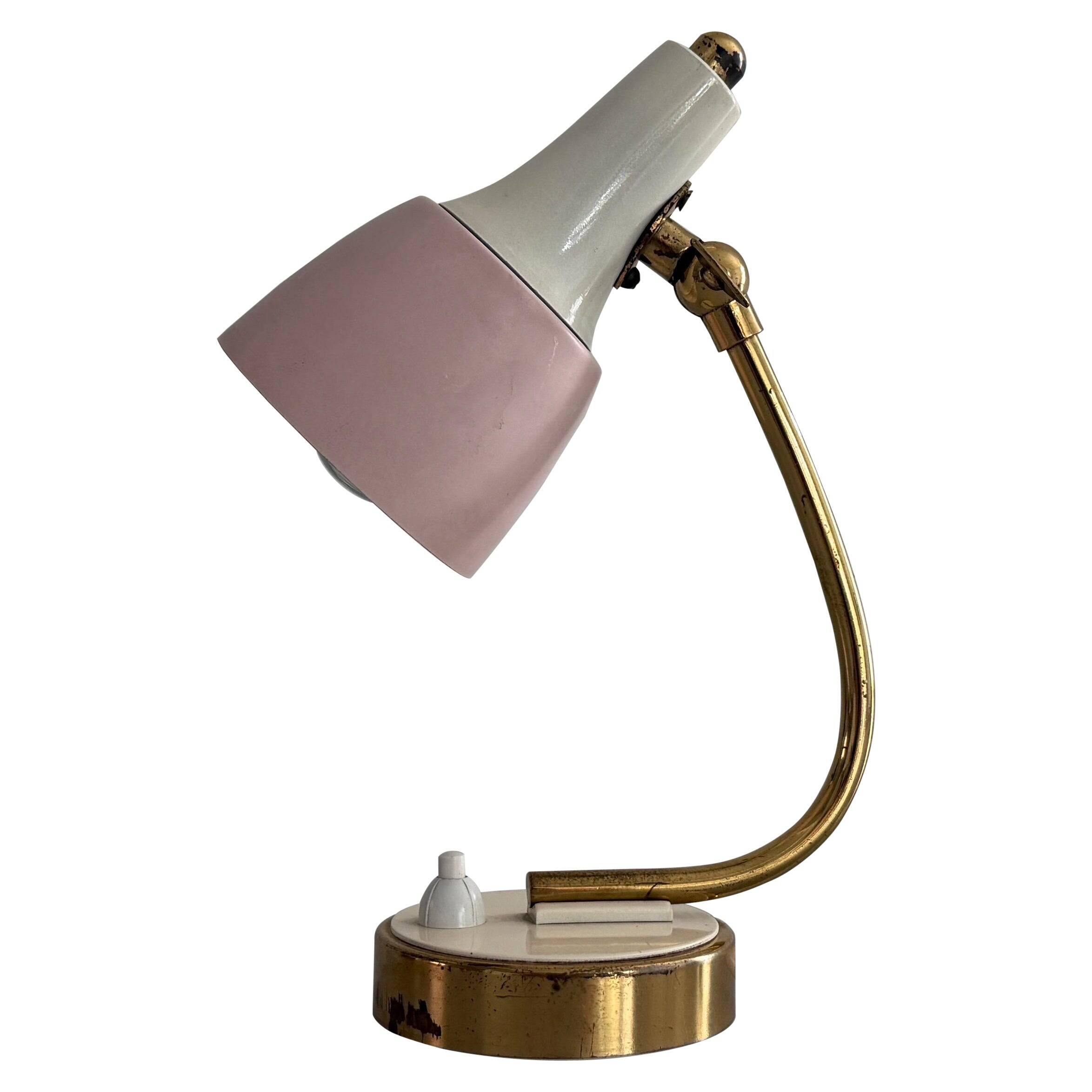 Simple table lamp with a pink metal head and brass body, 1960s, Germany.